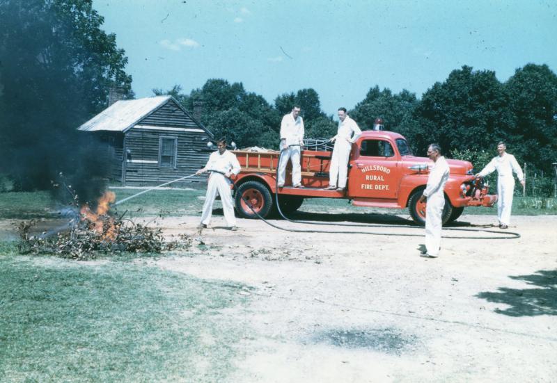 Pictured from left to right, Hillsborough Fire Department members James Chestnut, Lucius Brown, Allen Lloyd, George Gilmore, and Chandler Cates with the 1951 Town Rural truck.